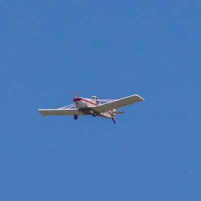 a large passenger jet flying through a clear blue sky