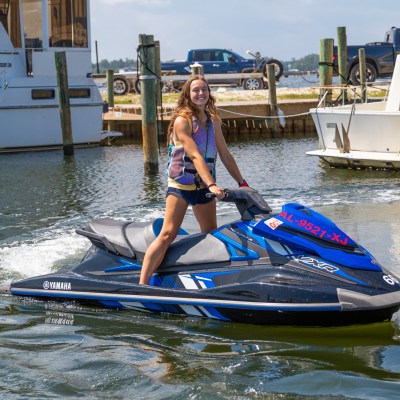 a woman on a jet ski