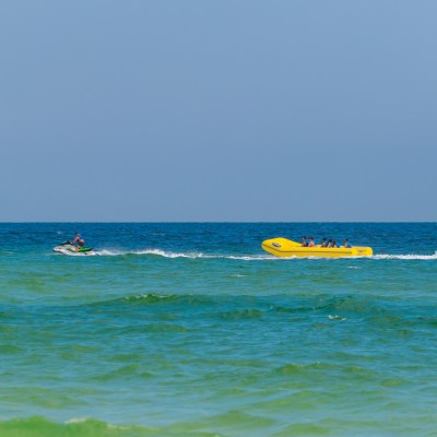 a group of people in a banana boat